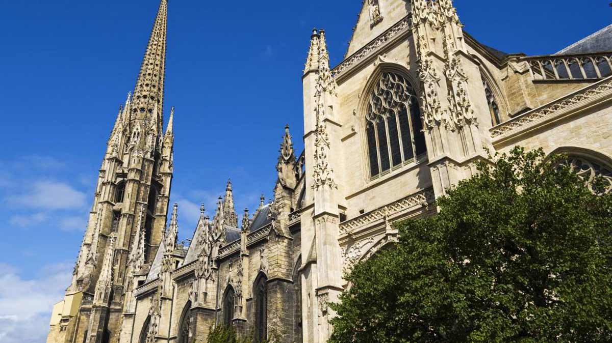 view looking up at main spire of St Michael church in France