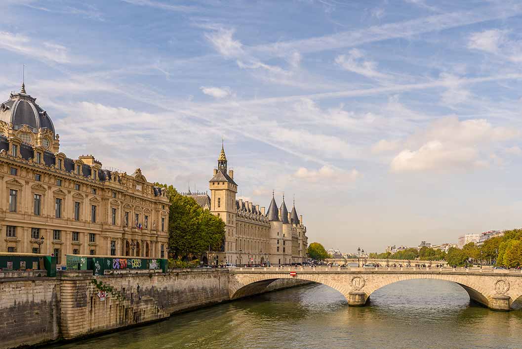 Tour guide showing guests around the Conciergerie Museum Paris