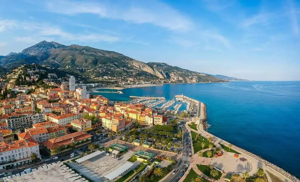 Beach and harbour leading to the sea in Menton of French Riveira