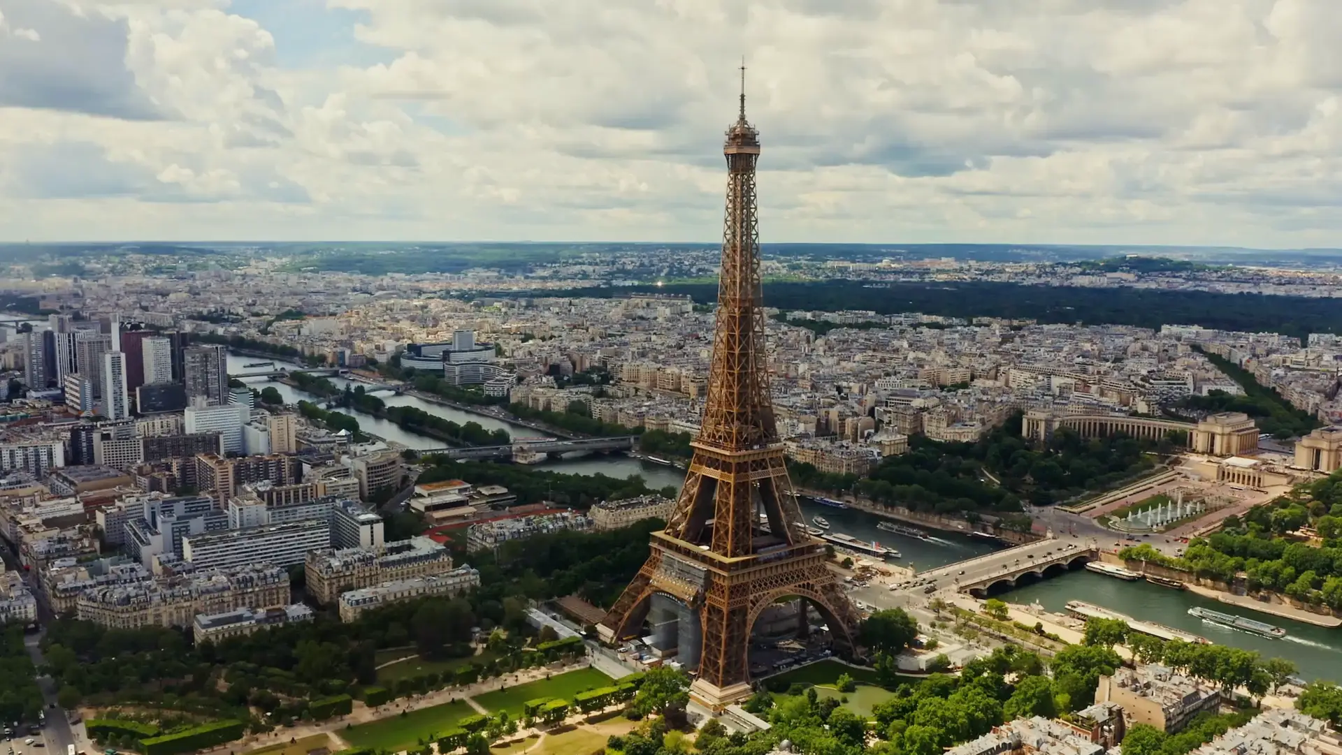 A view of the Paris Skyline including the eiffel tower and other notable sites.
