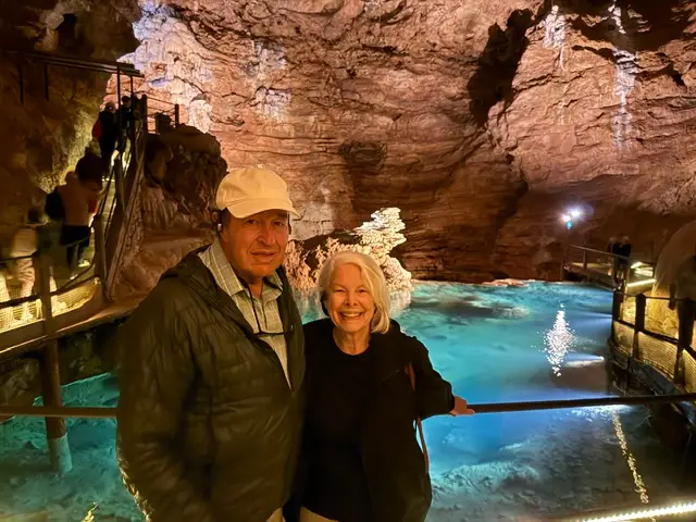 tourists inside the Gouffre de Padirac cave in Southwest France.