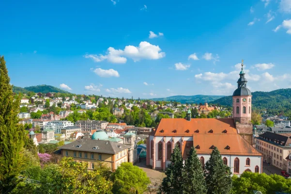 Panoramic view of Baden-Baden featuring the Stiftskirche and verdant hills, Schwarzwald, Baden-Württemberg, Germany